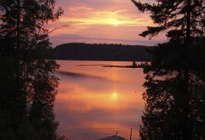 Sunset from a cottage overlooking a lake in Muskoka