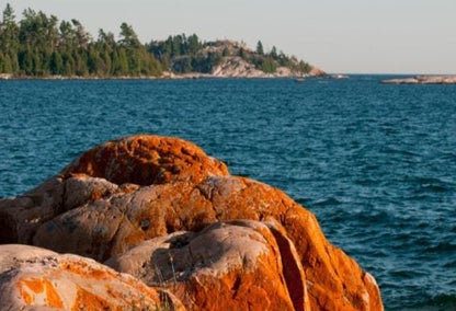 View of a rock on the waters of Round Lake