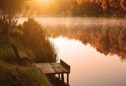 Dock on a lake in Muskoka during a sunset