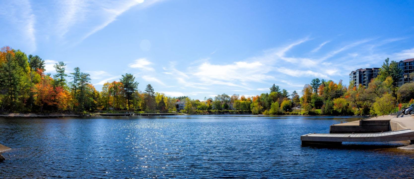 View of the bright blue lake in Bracebridge, Muskoka, Ontario
