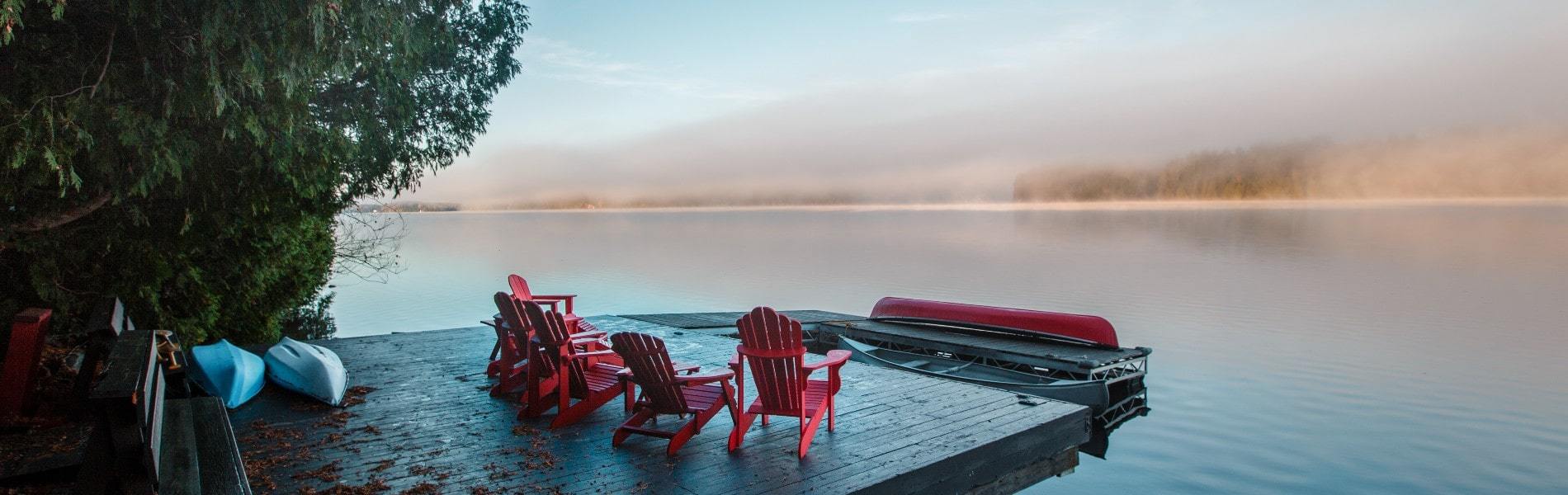 Muskoka chairs on an Ontario Lake