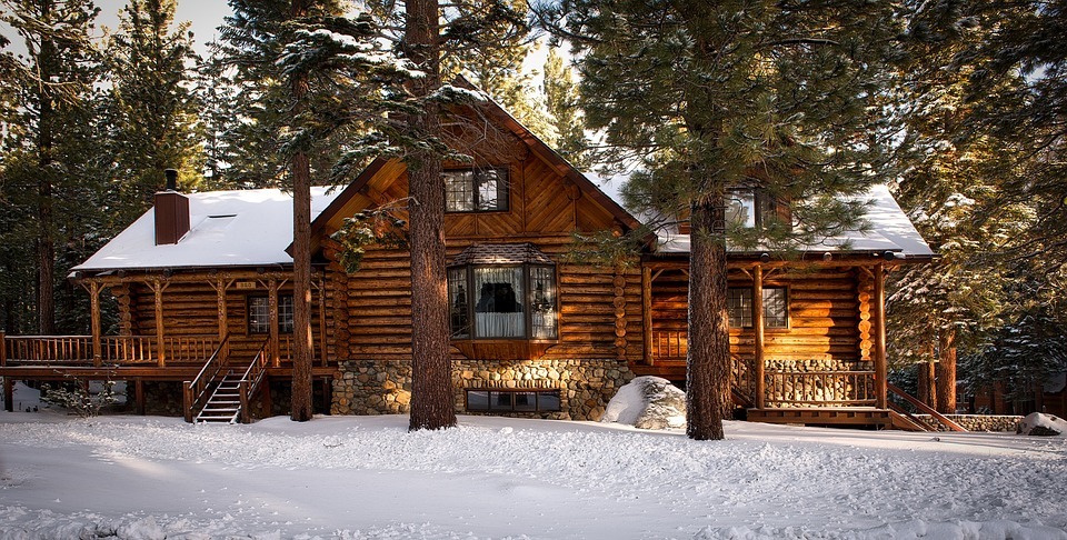 Cozy winter cottage amongst the snow